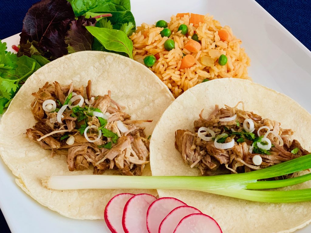 Carnitas tacos and rice