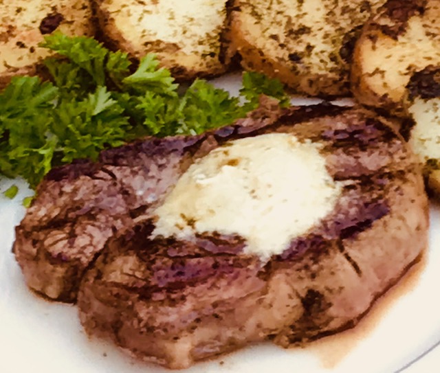 a steak with butter