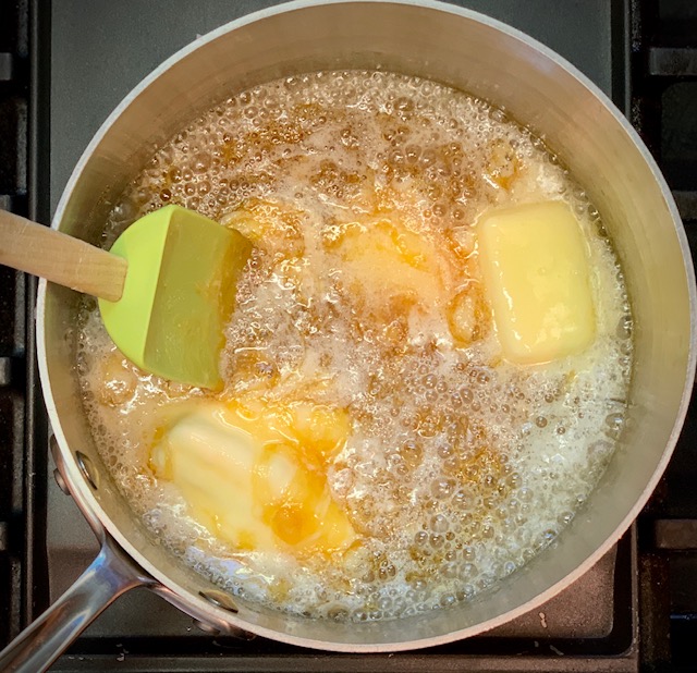 Adding butter to caramel