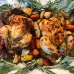 2 Game Hens on a plate with vegetables