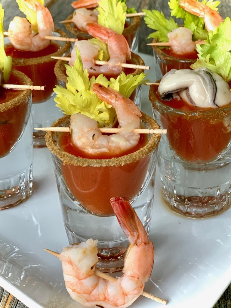 Bloody Mary shooters with shrimp and oysters