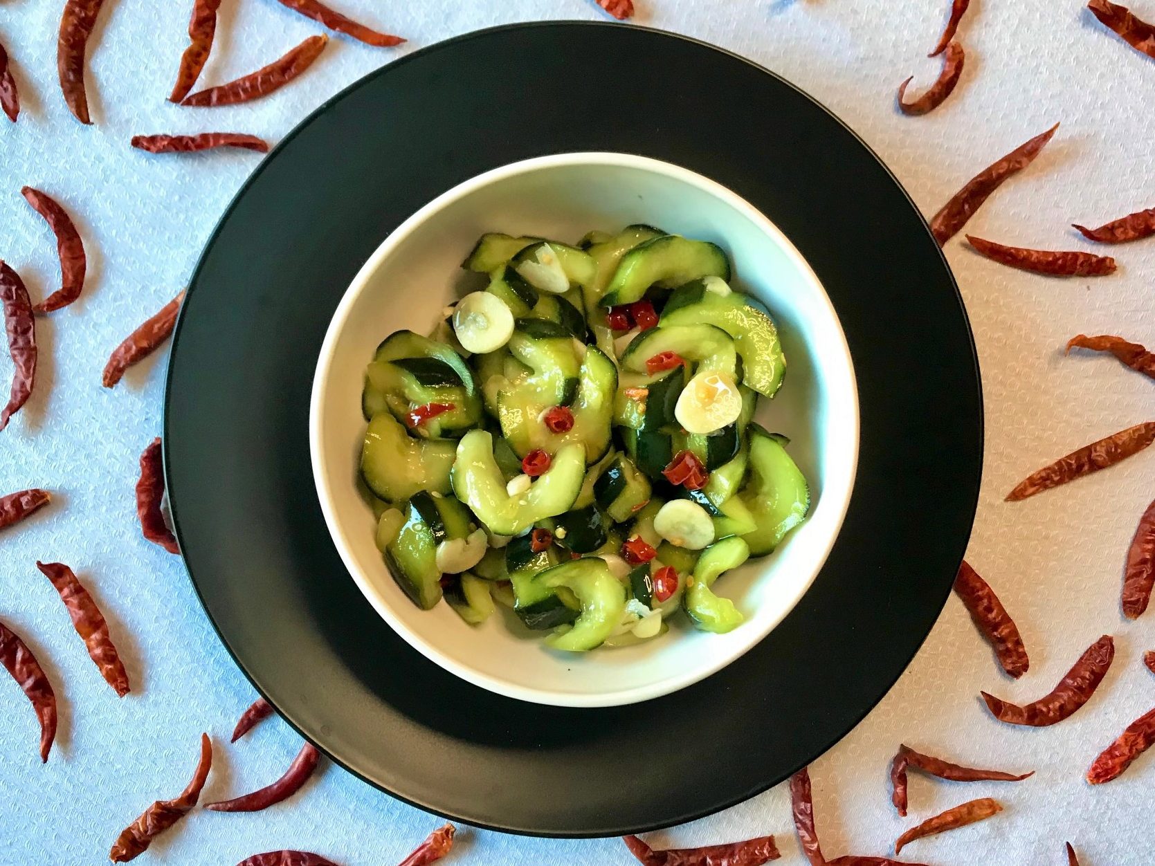 Asian Cucumber Salad in black bowl