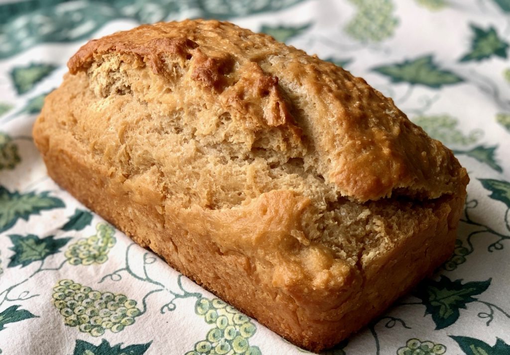 loaf of bread on green cloth