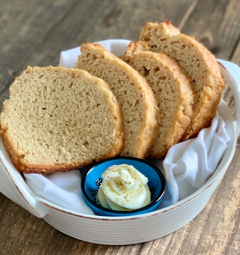 bread and butter in a white bowl