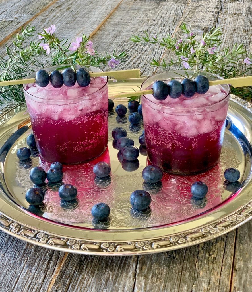 two blueberry vodka cocktails