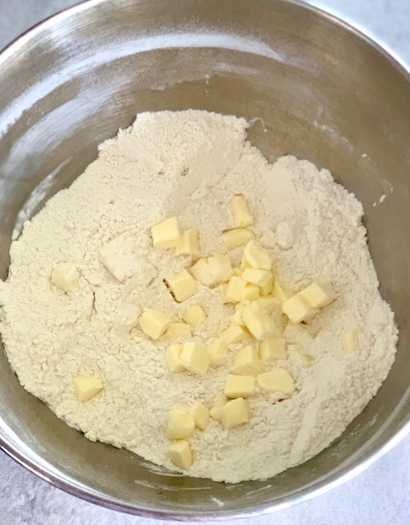 Flour with pieces of cold butter