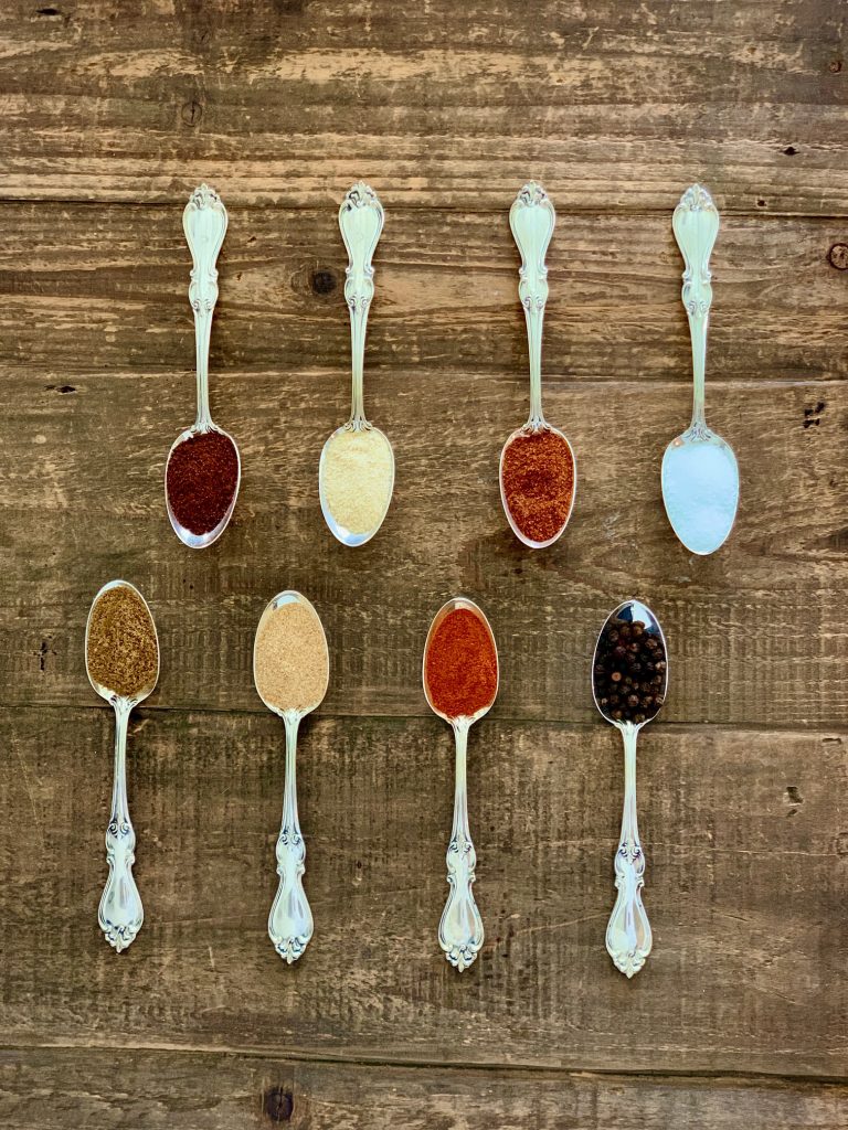 Homemade Taco Seasoning Mix ingredients on spoons