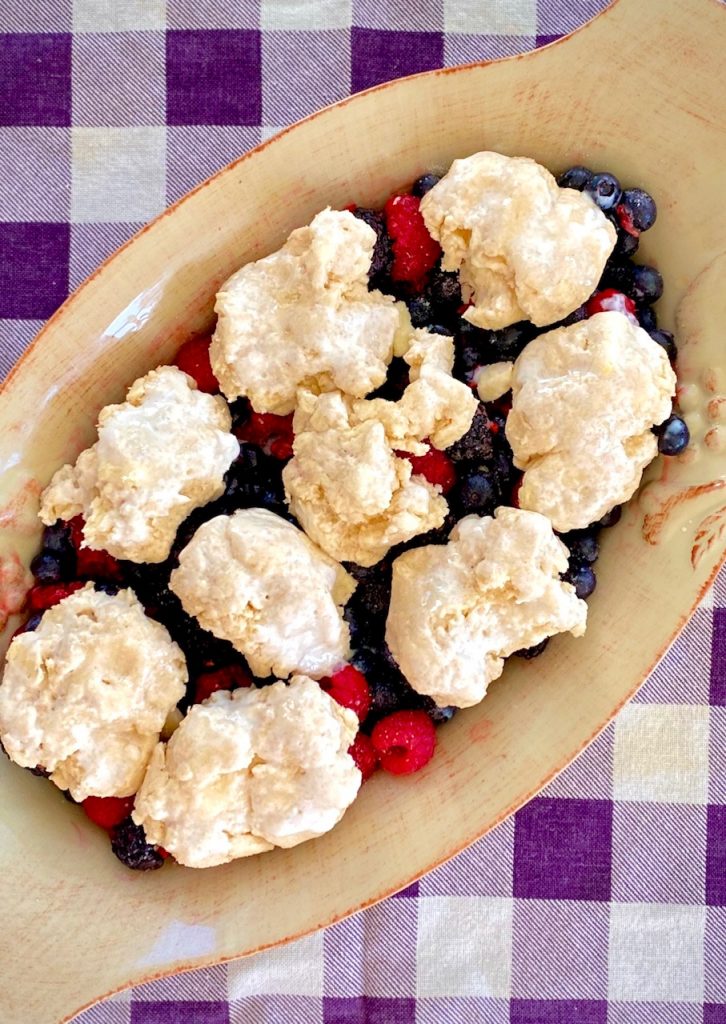 Cobbler ready to bake on purple napkin