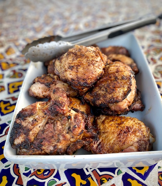 Jerk Chicken in a white baking dish