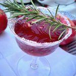 Prosecco Pomegranate Cocktail with Rosemary sprig