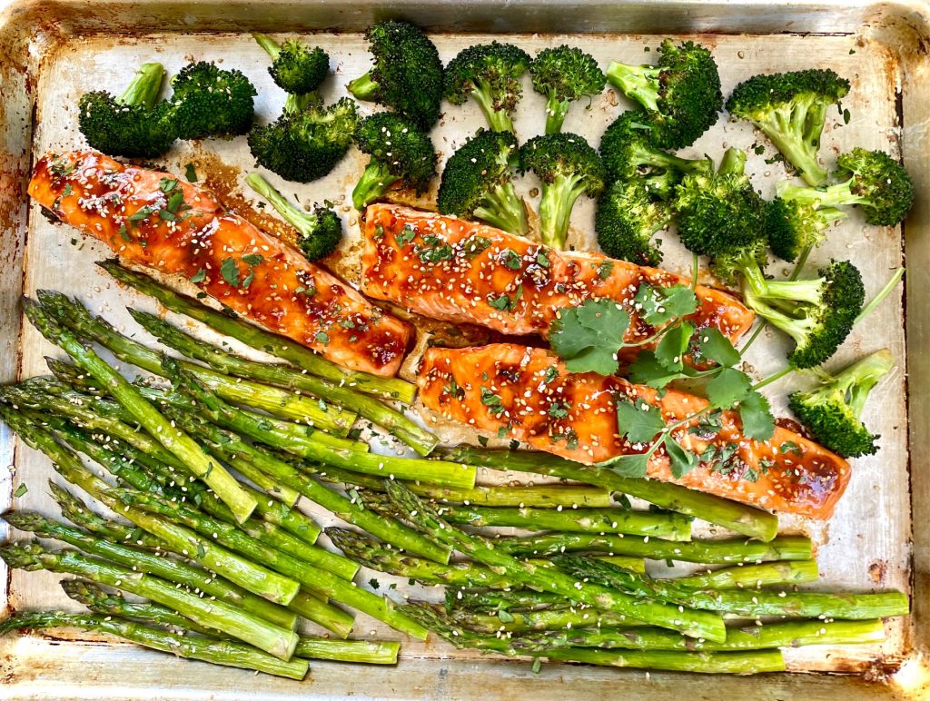 a sheet pan of Sheet Pan Salmon and Asparagus with Asian Marinade