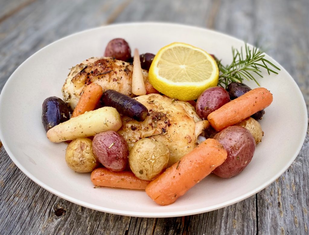 Sheet pan chicken and vegetables in a bowl