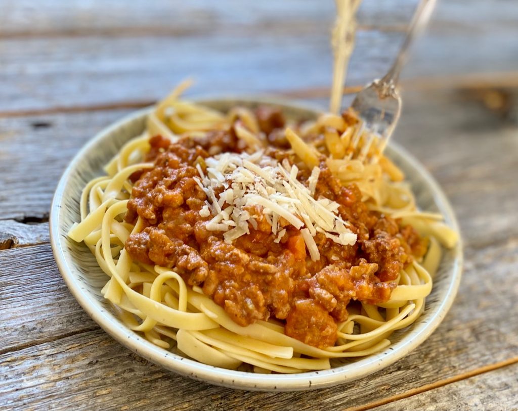 classic ragu in bowl with fork