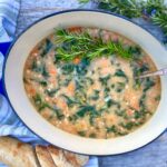One pan of kale white bean soup with rosemary