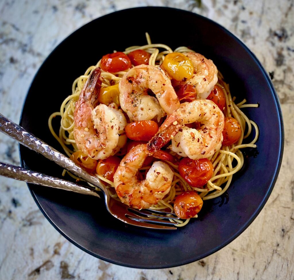 Black bowl with Shrimp and Tomatoes