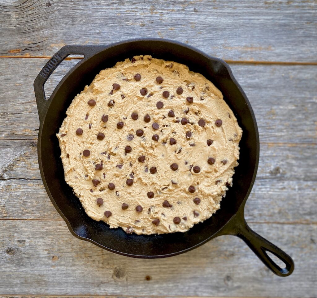 https://theartoffoodandwine.com/wp-content/uploads/2021/05/Uncooked-skillet-cookie-1024x965.jpg