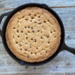 chocolate chip cookie in a cast iron skillet