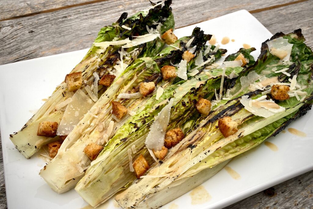 Grilled Caesar Salad on a white platter