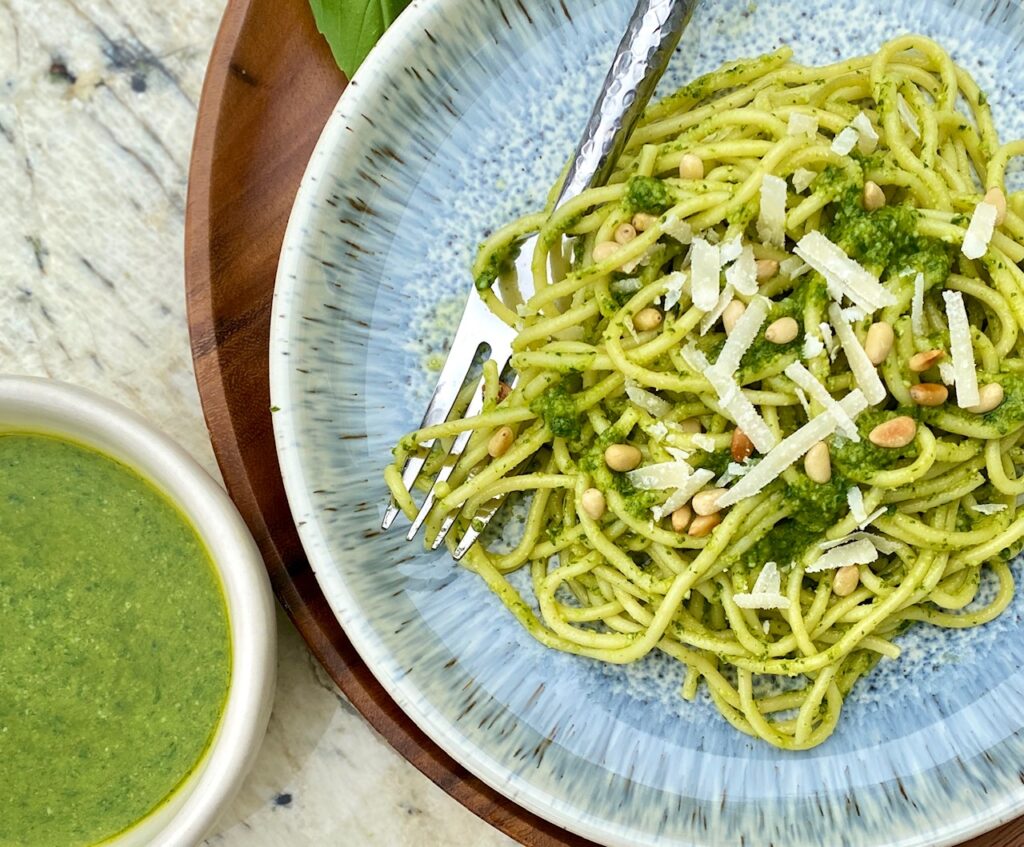 pesto pasta on blue plate