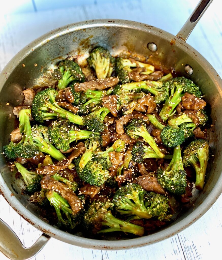broccoli beef with sauce in saute pan