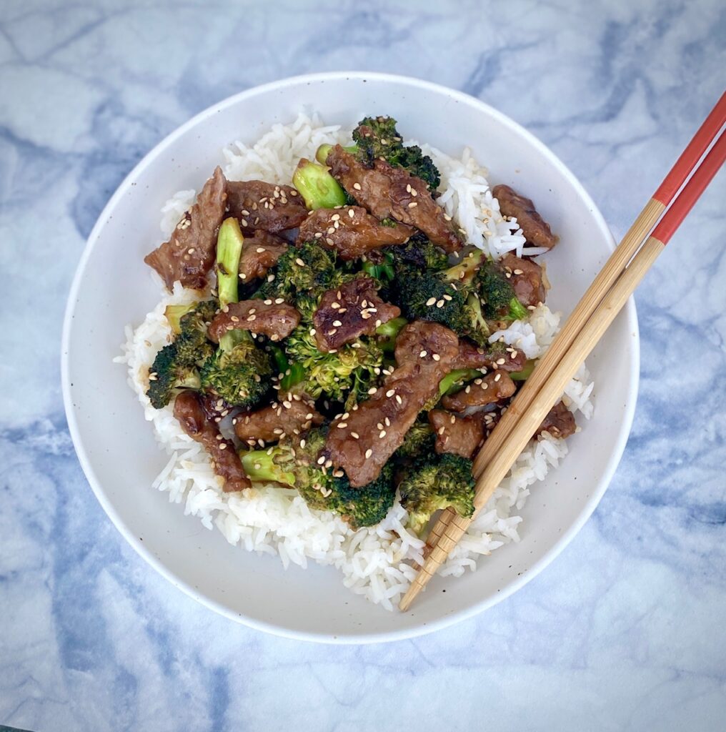 Beef Broccoli Stir Fry in a bowl with rice