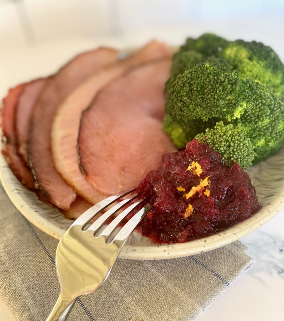 ham, broccoli and cranberry on a plate