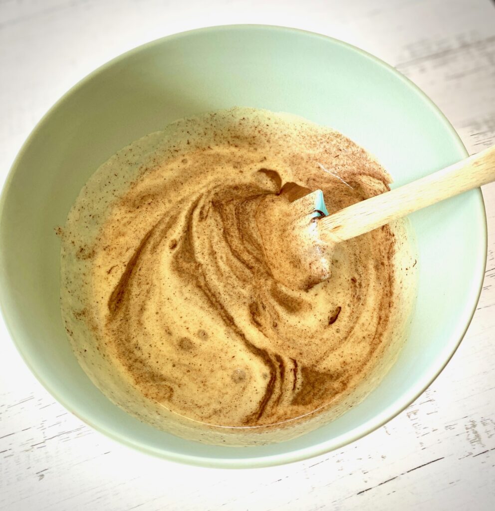 Blended egg batter with chocolate in bowl