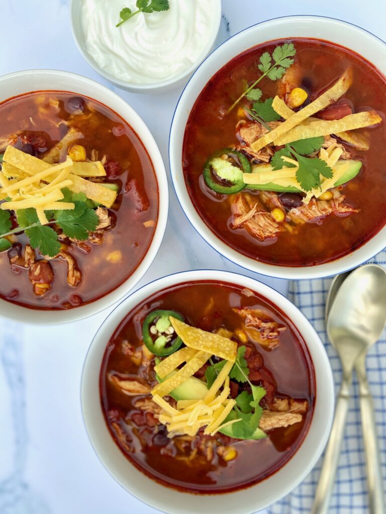 3 bowls of soup with chicken