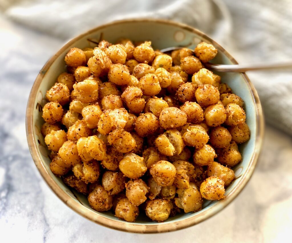 a small bowl with roasted chicekpeas