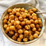 a small bowl with roasted chicekpeas