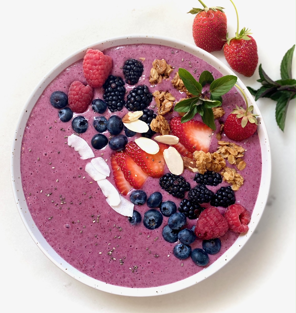 Berry smoothie in white bowl