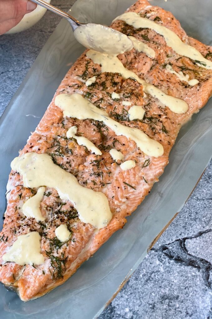 Salmon with sauce and spoon