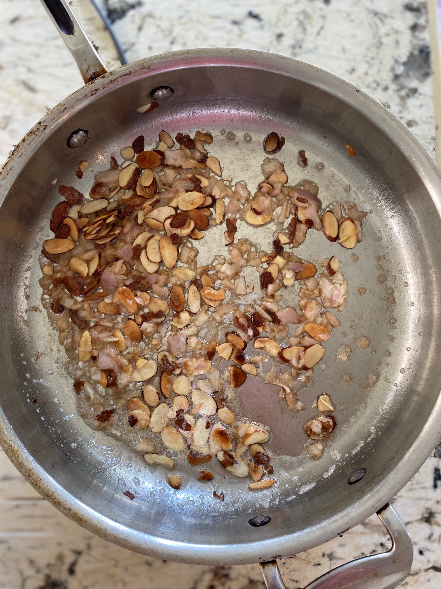 cooked almonds in a pan