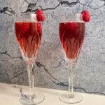 two kir royale cocktails with garnish