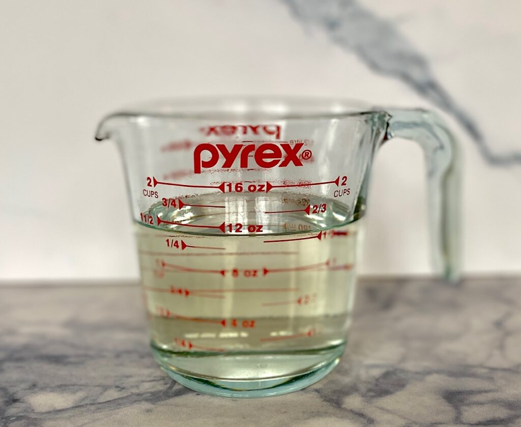 12 ounces simple syrup in measuring cup