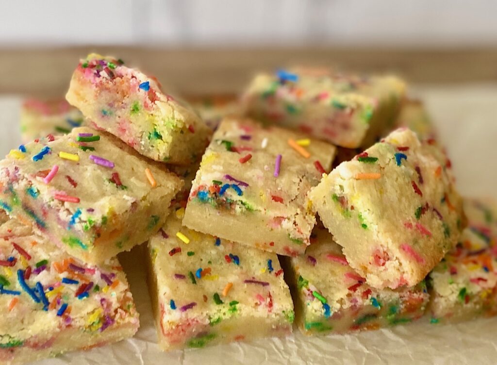 tray of sprinkled cookie bars