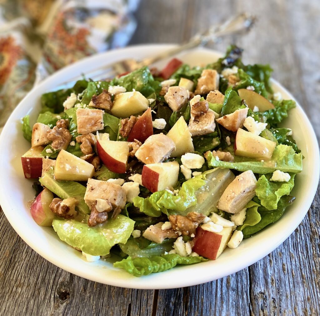 white bowl of apple chicken salad