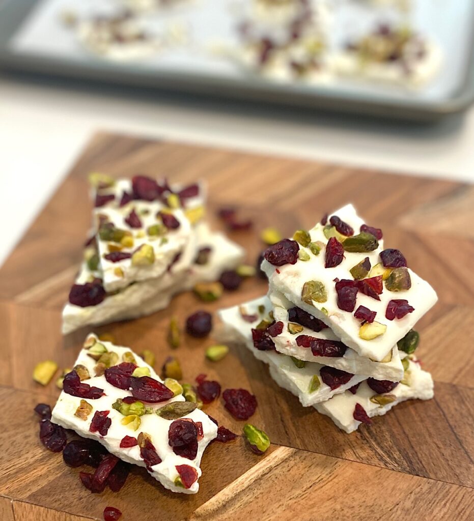 decorated candy bark on wood board