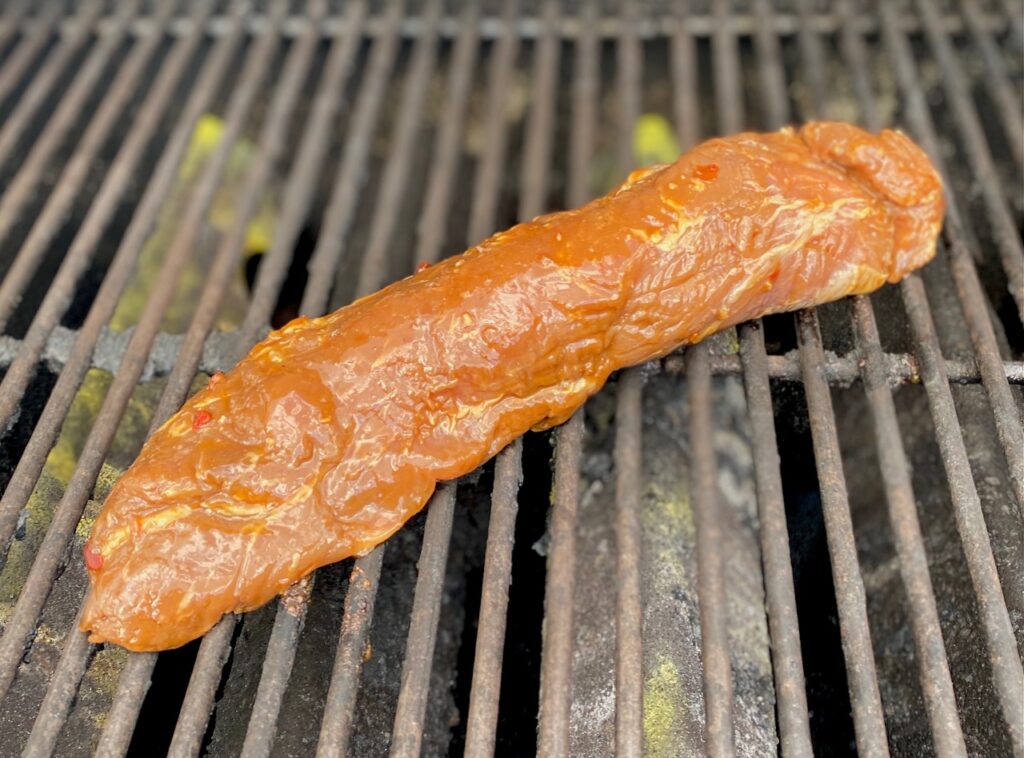 Pork tenderloin on grill