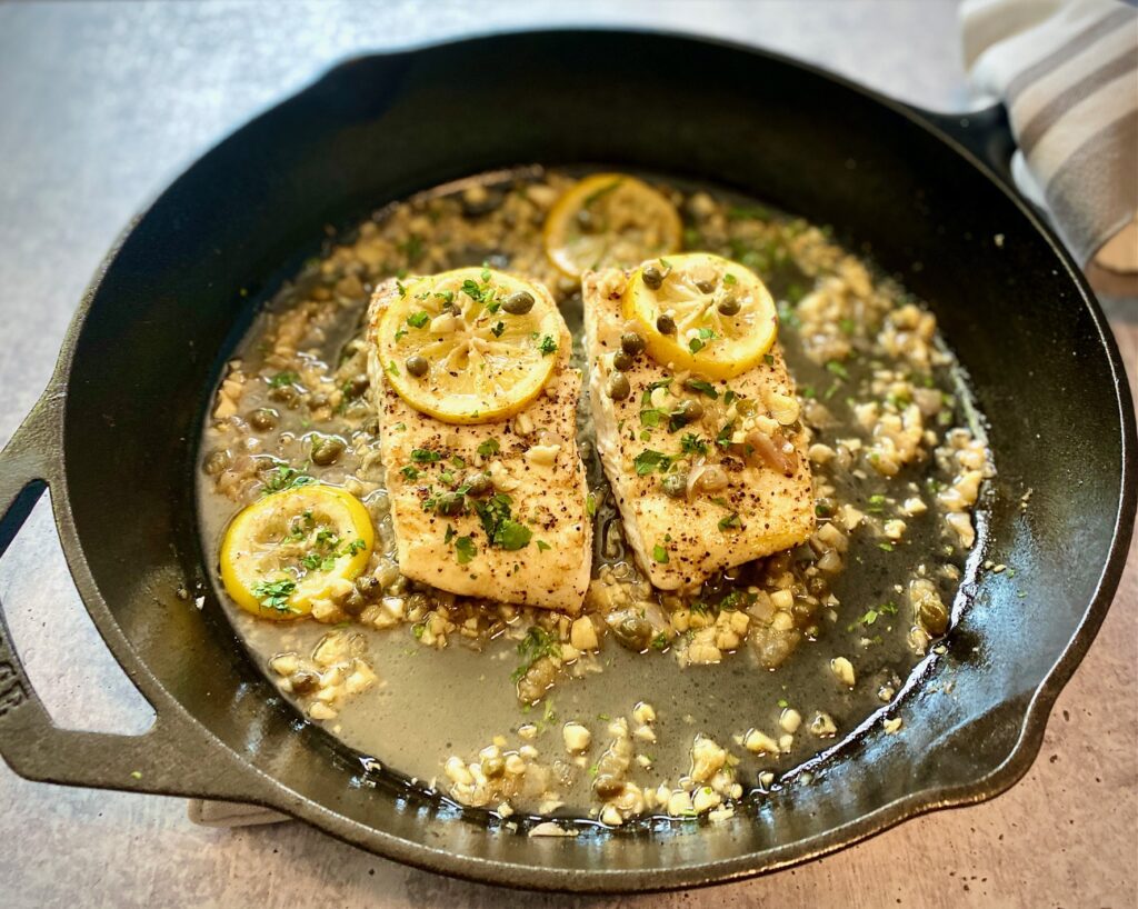 pan of seared white fish