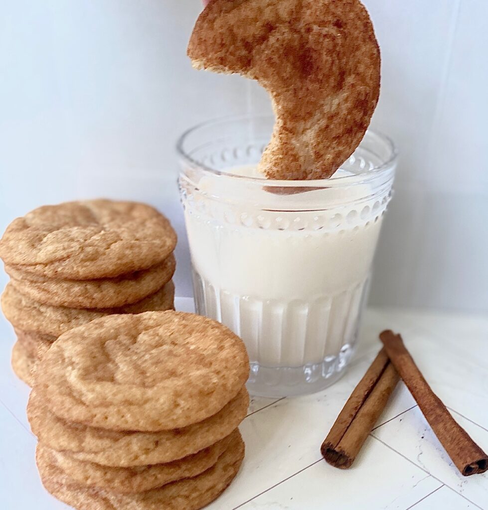 dunking cinnamon cookie in milk