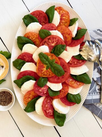 caprese salad with spoon and napkin
