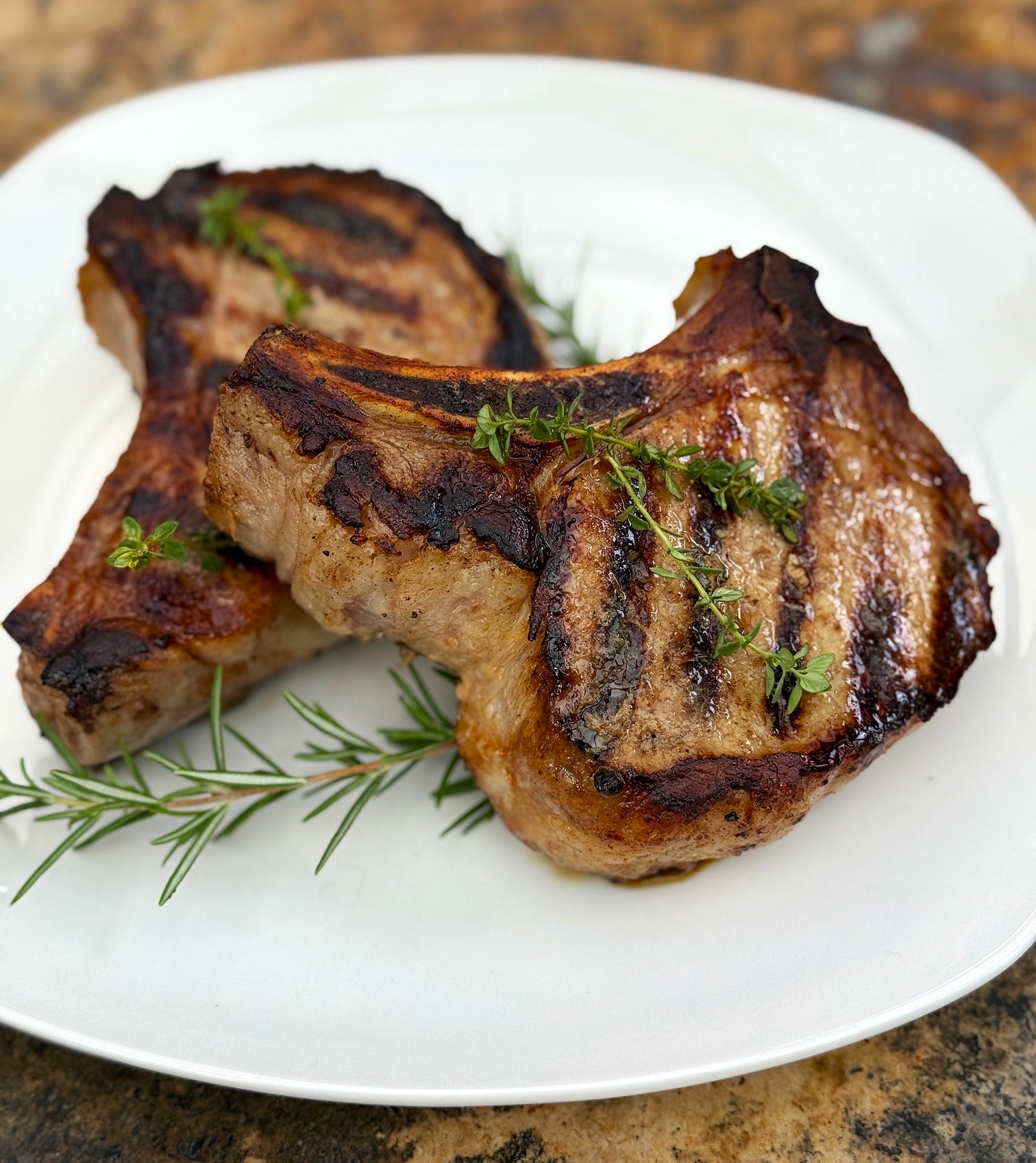2 pork chops on a plate
