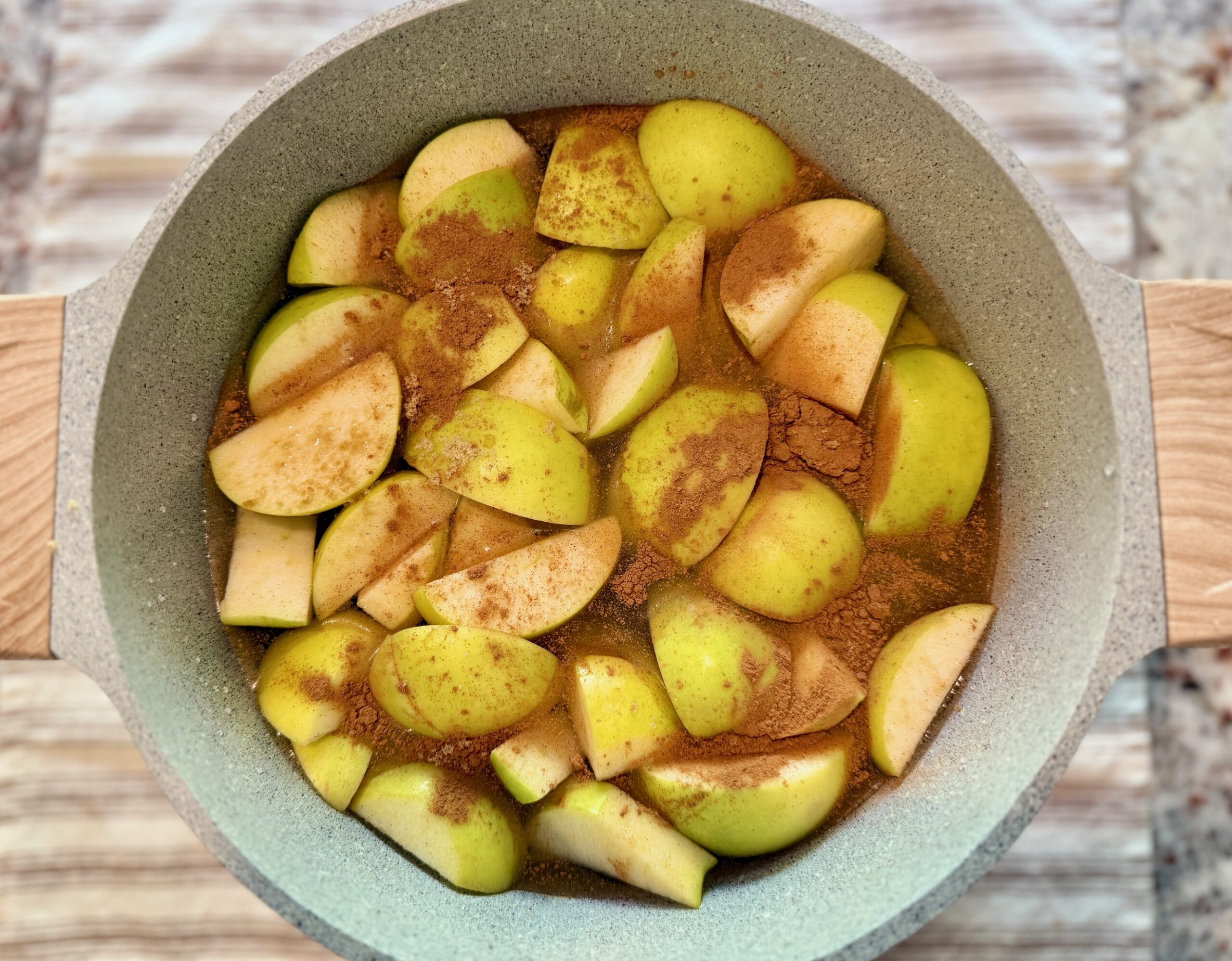 apples, cinnamon in a pot