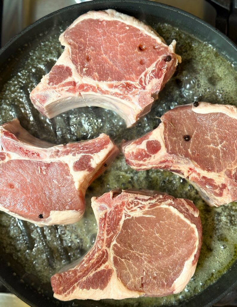 4 pork chops cooking