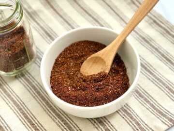 Chili seasoning with jar and bowl and spoon