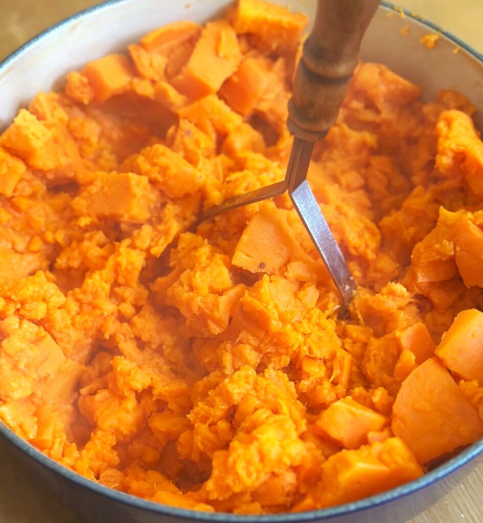 Mashing sweet potatoes