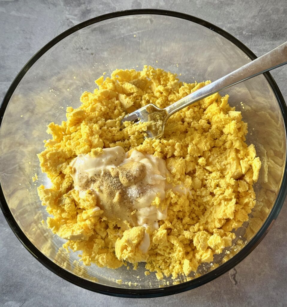 Bowl of yolks, mustard, vinegar