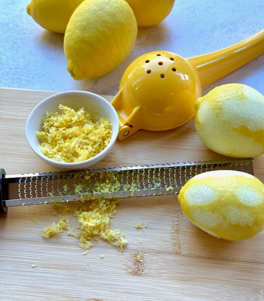 lemon zest, lemons with zester and a juicer