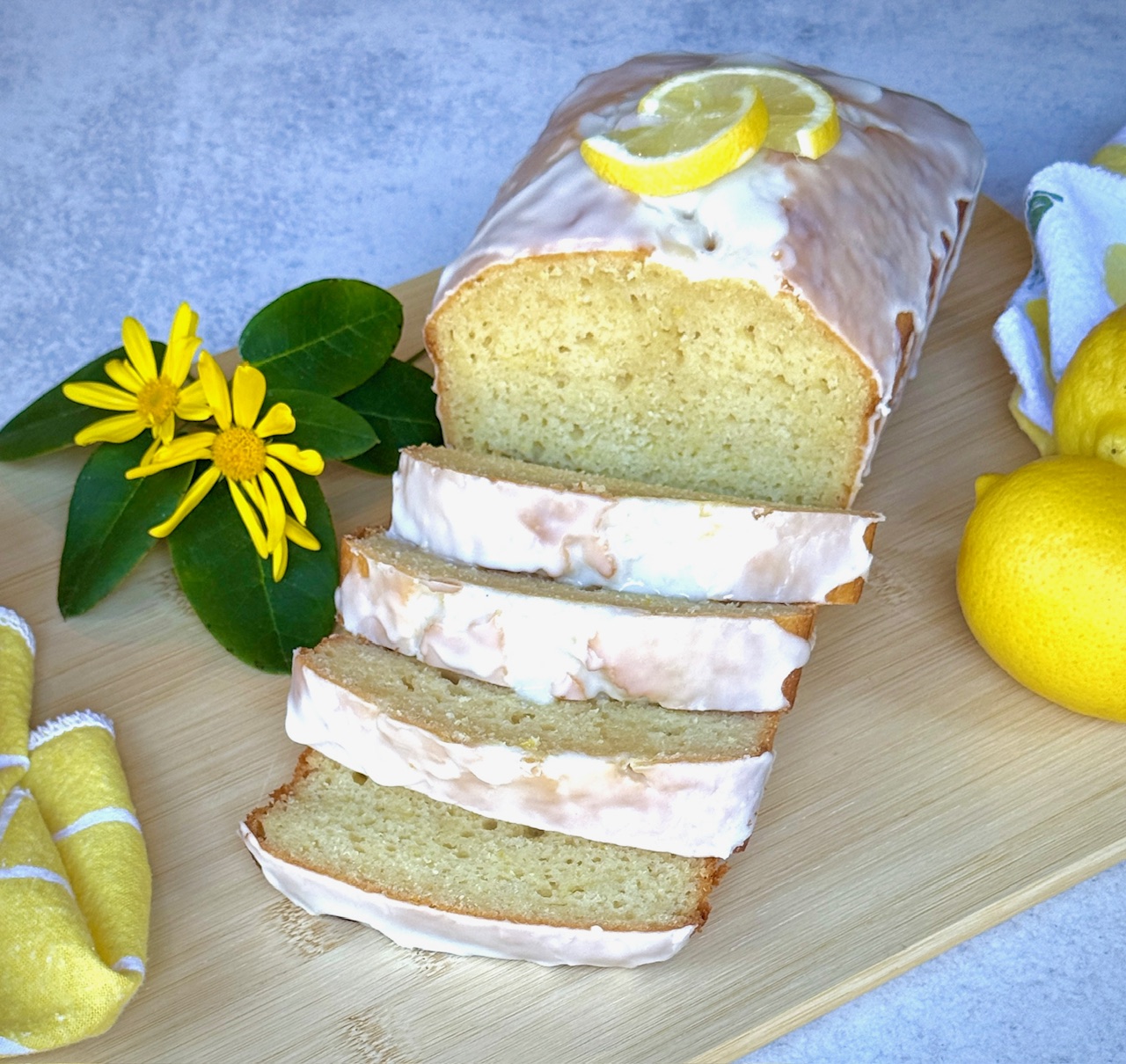 lemon loaf cake on a wooden board